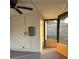 Enclosed sunroom with ceiling fan at 228 Cannon Way, Casselberry, FL 32707