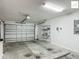 Spacious garage with ample storage space, ready for your vehicles and projects at 2311 Pine Ridge St, The Villages, FL 32162