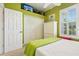 Cozy bedroom features a white door, spacious closet, and a bright window for natural light at 2512 Baywater Rd, Tavares, FL 32778