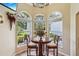 Eat-in kitchen nook with bay windows overlooking the landscaped backyard at 2512 Baywater Rd, Tavares, FL 32778