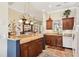 Charming kitchen with granite countertops and a stylish backsplash design at 2512 Baywater Rd, Tavares, FL 32778