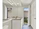 Modern bathroom featuring stylish floors, granite vanity, and natural light at 2815 Spyglass Cv, Longwood, FL 32779