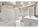 Bathroom featuring tub with shower, patterned tile, and integrated sink and cabinet at 2815 Spyglass Cv, Longwood, FL 32779