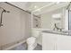 Modern bathroom with stylish tile, walk-in shower, and a granite vanity at 2815 Spyglass Cv, Longwood, FL 32779