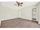 Bright bedroom with hardwood floors and ample closet space at 2815 Spyglass Cv, Longwood, FL 32779