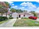 Charming townhome featuring a well-manicured lawn and a private one-car garage in a residential neighborhood at 2815 Spyglass Cv, Longwood, FL 32779