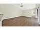 Bright living room with hardwood floors and sliding glass doors for natural light at 2815 Spyglass Cv, Longwood, FL 32779