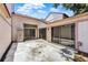 Rear patio of a home with sliding glass doors and a storage closet in the backyard at 2815 Spyglass Cv, Longwood, FL 32779