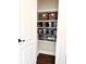 Pantry in the closet provides ample space for storage and organization at 32511 Purdum Ave, Leesburg, FL 34788