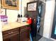 Bright laundry area featuring modern appliances and ample counter space at 32511 Purdum Ave, Leesburg, FL 34788