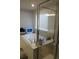 Bright bathroom showcases a soaking tub with a window view and a glass-enclosed shower at 418 Winter Bliss Ln, Mount Dora, FL 32757