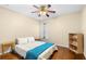 Cozy bedroom with hardwood floors and simple decor at 4909 Kelso St, Leesburg, FL 34748