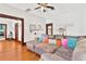 Spacious living room with beautiful hardwood floors and comfortable seating at 501 Washington Ave, Eustis, FL 32726