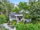 Charming home with well maintained lawn, lovely landscaping, and inviting front entrance at 504 Gilliam St, Wildwood, FL 34785