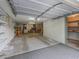 Interior view of the three car garage at 504 Gilliam St, Wildwood, FL 34785