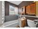 Modest bathroom features a combined tub and shower, plus a compact vanity and toilet at 54544 Buckhorn Rd, Astor, FL 32102