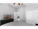 Cozy bedroom featuring a serene atmosphere, closet, and doorway at 5715 Illumination Ln, Leesburg, FL 34748
