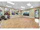 Brightly lit fitness area with mirrored walls and ample space for exercise at 5715 Illumination Ln, Leesburg, FL 34748