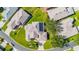Birds eye view of a well maintained single Gathering home with lush green grass at 5740 Bounty Cir, Tavares, FL 32778