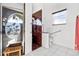 Bathroom showing a walk-in shower, grab bars, a toilet, and decorative tile at 5740 Bounty Cir, Tavares, FL 32778