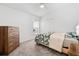 Bedroom showcasing a large bed, carpeted floors, and neutral walls and decor at 5740 Bounty Cir, Tavares, FL 32778