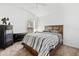 Bedroom showcasing a large bed, carpeted floors, and neutral walls and decor at 5740 Bounty Cir, Tavares, FL 32778