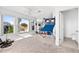 Bright bonus room with a basketball game and multiple windows at 5740 Bounty Cir, Tavares, FL 32778