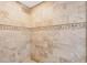 Close-up of the light brown tile wall and floor in the walk-in shower at 8160 Se 164Th Pl, Summerfield, FL 34491