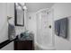 Bathroom featuring a glass bowl sink, stand up shower, and modern fixtures at 1025 Capella Dr, Tavares, FL 32778