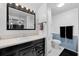 Bright bathroom featuring modern fixtures, vanity, and ample lighting at 1025 Capella Dr, Tavares, FL 32778