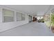 Spacious covered patio perfect for outdoor dining and relaxation with ample natural light at 1025 Capella Dr, Tavares, FL 32778
