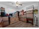 Storage room with neatly stacked boxes and furniture at 1025 Capella Dr, Tavares, FL 32778