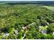 Sprawling home nestled among lush greenery, offering privacy and a serene natural setting at 1053 Cavern Dr, Apopka, FL 32712