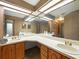 Spacious bathroom features dual sinks, lots of counter space, and vanity lighting at 1053 Cavern Dr, Apopka, FL 32712