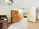 Office area features tile floors, desk, hutch, and open flow to other areas at 1053 Cavern Dr, Apopka, FL 32712