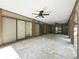 Covered patio area with sliding doors, recessed lighting, and ceiling fans at 1053 Cavern Dr, Apopka, FL 32712