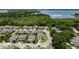 Community aerial view near Lake Dora showcasing lush greenery and serene waterfront homes at 1131 Dora Parc Ln, Mount Dora, FL 32757