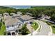 Enjoy the view in this neighborhood, showcasing lush greenery and nearby lake access from this beautifully landscaped property at 1131 Dora Parc Ln, Mount Dora, FL 32757