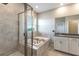 Bright bathroom featuring a soaking tub with tile surround and separate glass-enclosed shower at 1131 Dora Parc Ln, Mount Dora, FL 32757