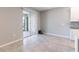 Dining area with tiled floor and sliding glass door to patio at 1131 Dora Parc Ln, Mount Dora, FL 32757