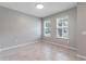 Bright flex room featuring neutral walls, tiled floor, and two large windows for natural light at 1131 Dora Parc Ln, Mount Dora, FL 32757