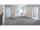 Upstairs loft with a white couch and gray carpet at 1131 Dora Parc Ln, Mount Dora, FL 32757