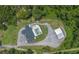 Gorgeous luxury estate with a pool, guest house, and circular driveway from above at 14227 County Road 455, Clermont, FL 34711