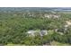Expansive wooded property with modern home, pool and barn at 14227 County Road 455, Clermont, FL 34711