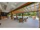 Outdoor pool and patio area perfect for entertaining with lush landscaping at 14227 County Road 455, Clermont, FL 34711
