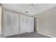 Bedroom with two closets and a neutral color scheme, ready for personalization at 1491 Providence Blvd, Deltona, FL 32725