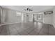 Spacious living room with tile floors, ceiling fan and natural light at 1491 Providence Blvd, Deltona, FL 32725