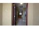View from the doorway showing the beautiful kitchen with stainless steel appliances and granite countertops at 1496 Lime Grove Ln, The Villages, FL 32162