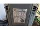 Image shows the model, serial number and manufacture date for the HVAC system at 1496 Lime Grove Ln, The Villages, FL 32162