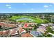 A beautiful golf course community showcases a desirable property with manicured lawns and lush landscaping at 1509 Trenton Ln, The Villages, FL 32162